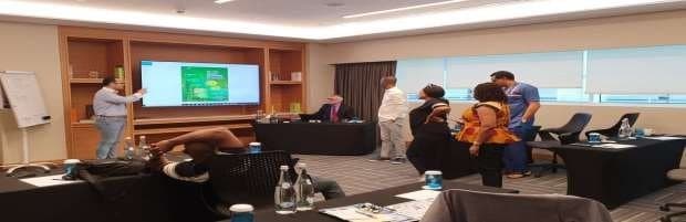 Wide view of delegates in a training room
