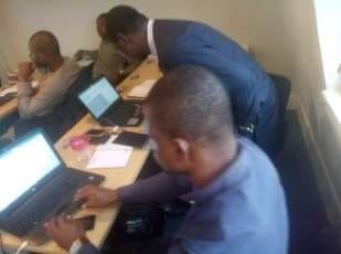 Delegates working on laptops