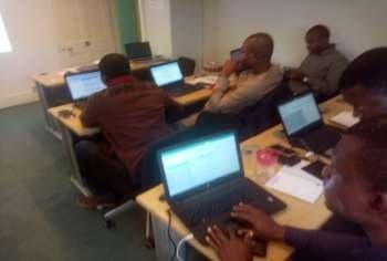 Delegates working through a risk-analysis exercise
