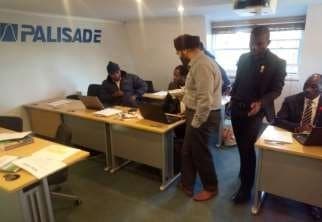 Instructor with delegates at a Palisade training session