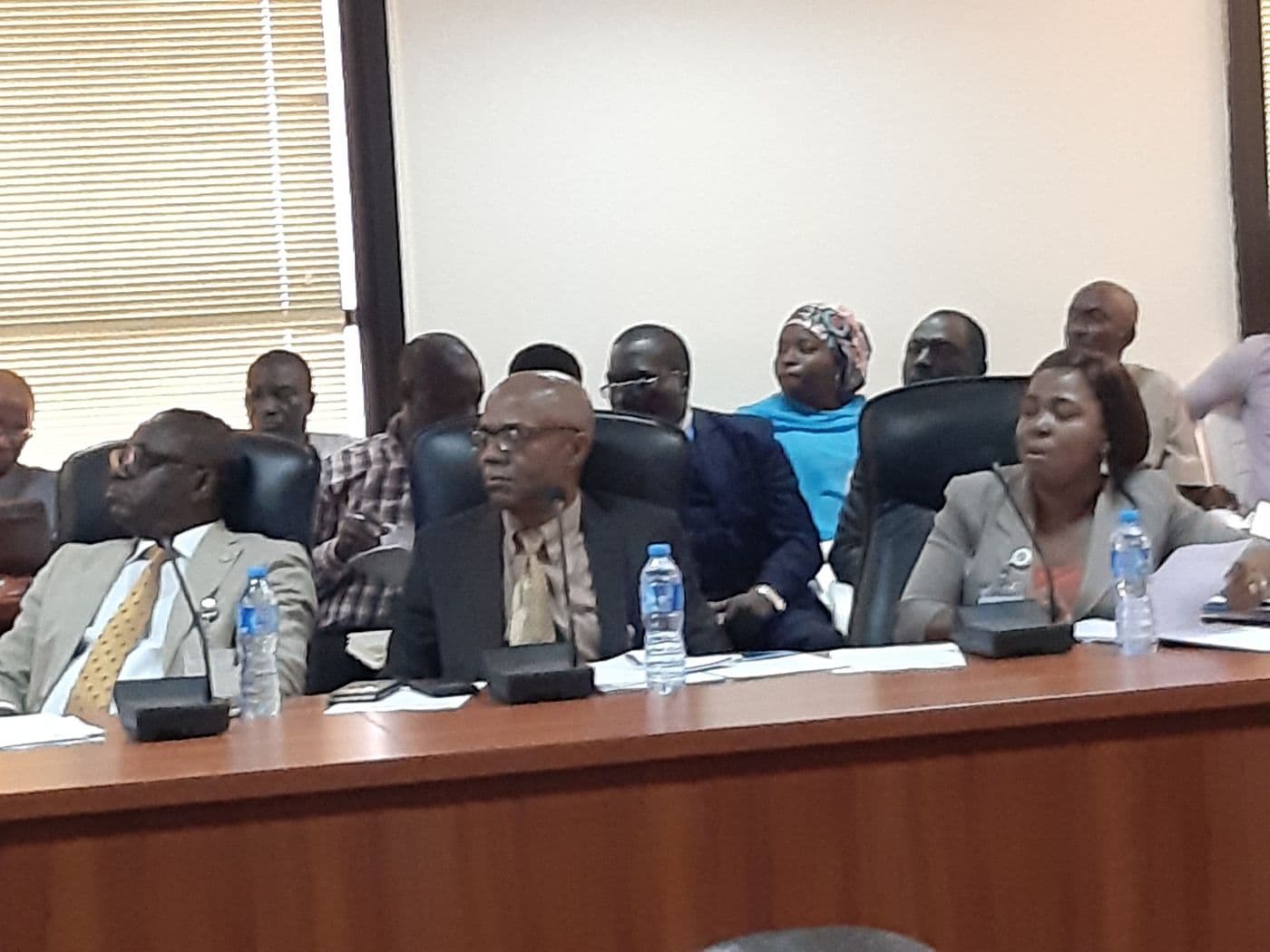 Delegates seated along the table