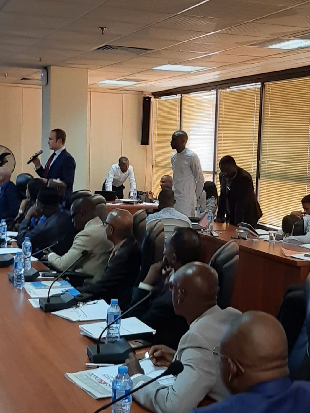 Delegates in discussion during the session