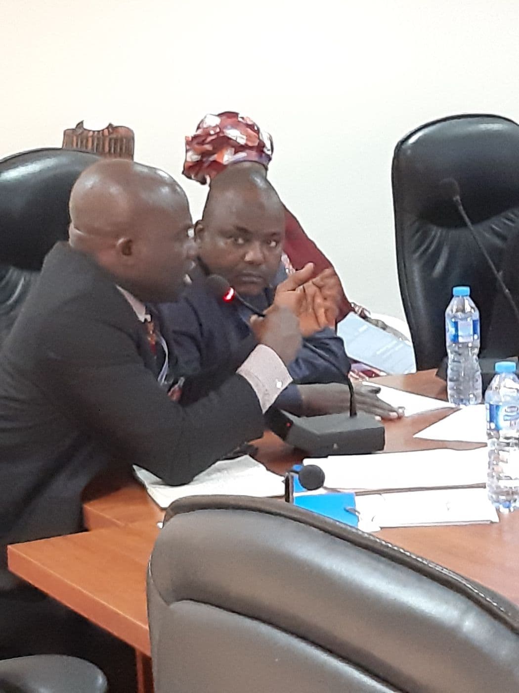 Two delegates in discussion